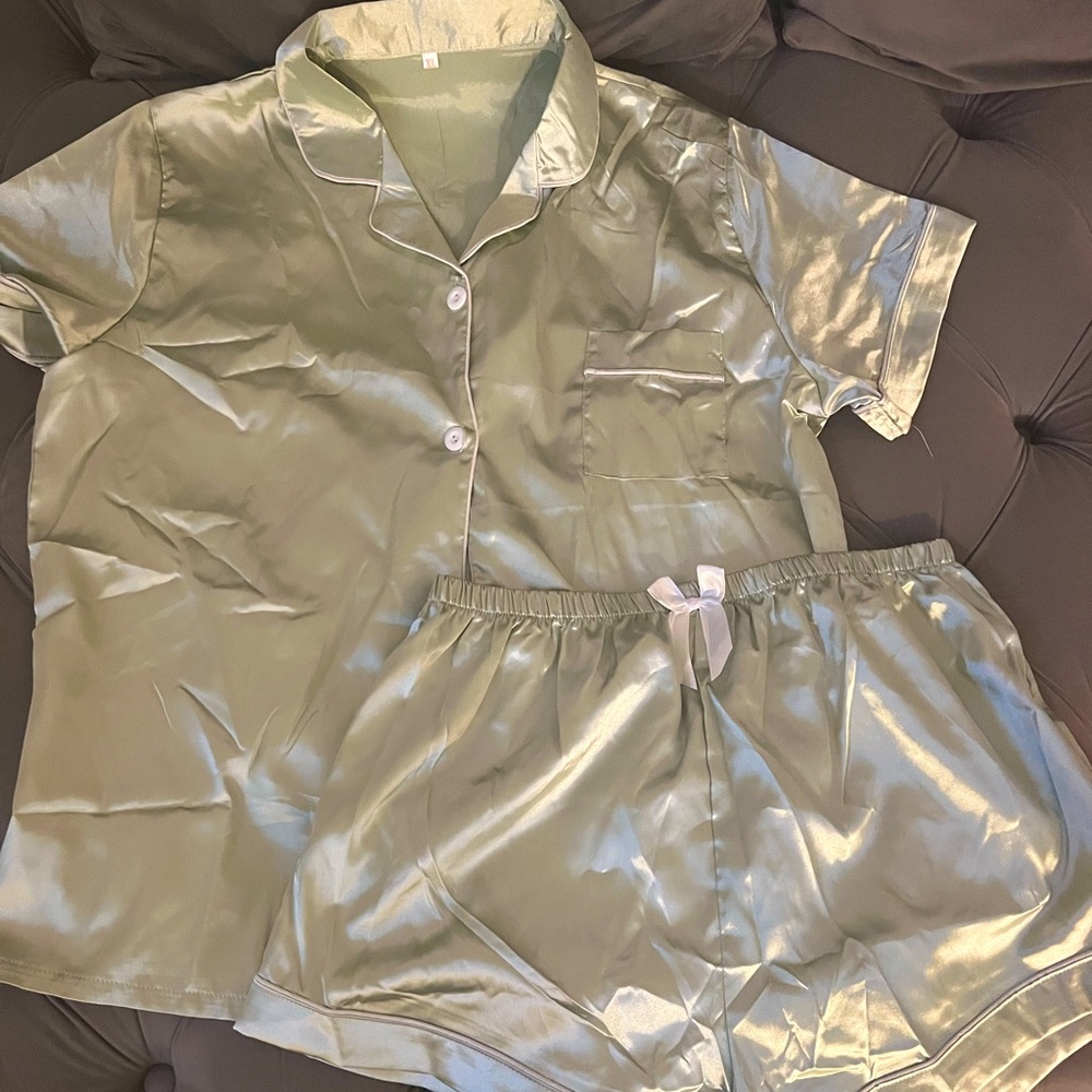 Three satin pajamas short sets. Runs a little small fits more like a large.